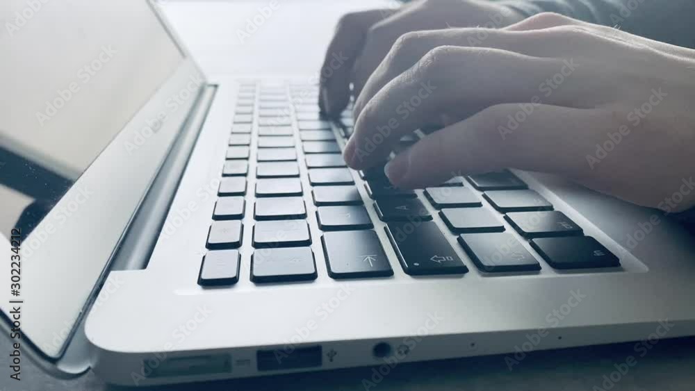 Hands typing on keyboard on office desk. Hands typing on keyboard on office desk.