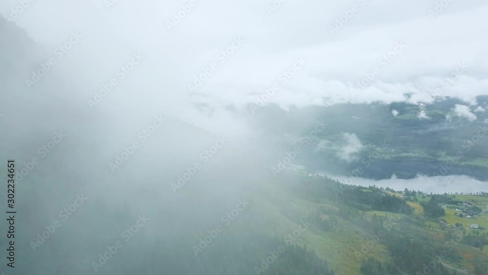 Aerial shot through the clouds in the mountains of Norway. Aerial shot through the clouds in the mountains of Norway.