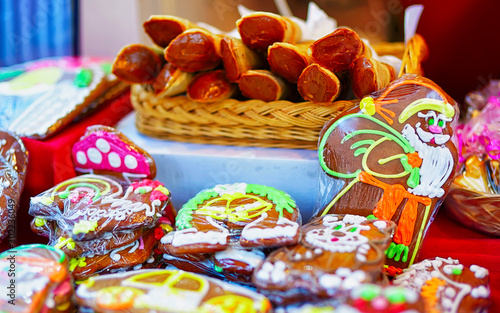 Santa Claus and other gingerbreads displayed for sale at the Christmas market in Riga, Latvia. At the fair people can find festive souvenirs, goods, warm clothes, traditional food and hot drinks.