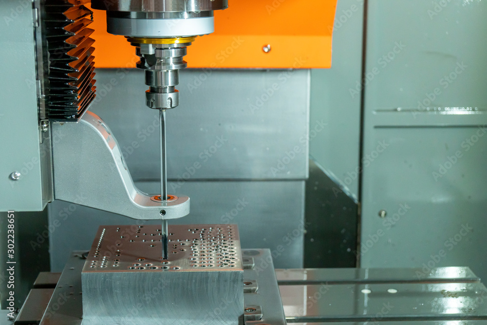 The gun drill machine make the water channel at injection mould . The