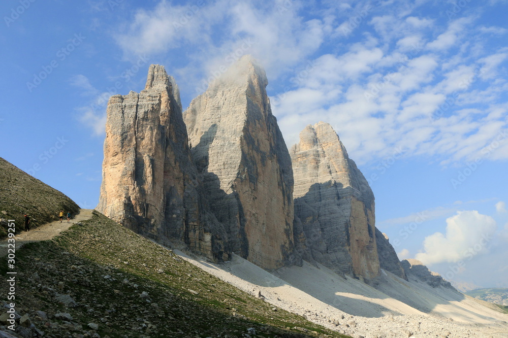 The three peaks of Lavaredo, also called the Drei Zinnen, are three distinctive battlement-like peaks, in the Sexten Dolomites of northeastern Italy.  They are probably one of the best-known mountain 