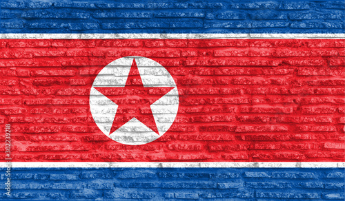 Colorful painted national flag of North Korea on old brick wall. Illustration.