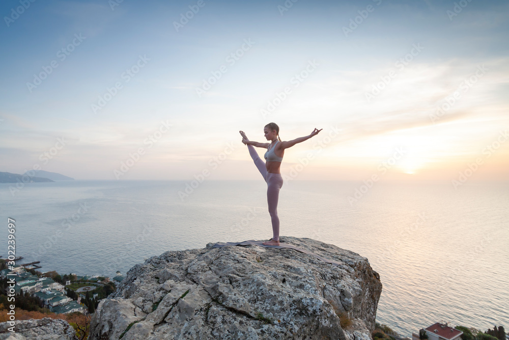 girl practices yoga at sunrise girl practices yoga at sunrise
