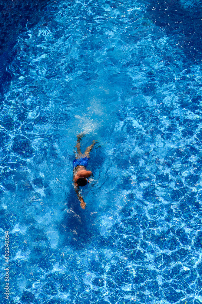 Top view of a man in swimming pool