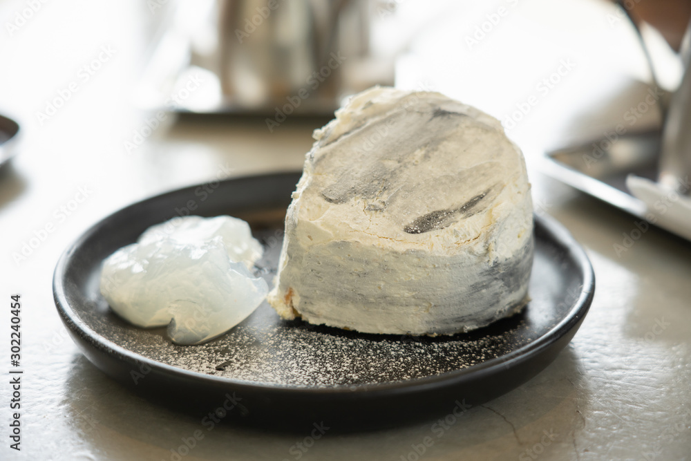 Thai style coconut cake on the plate. Food background, dessert. Thai style coconut cake on the plate. Food background, dessert.