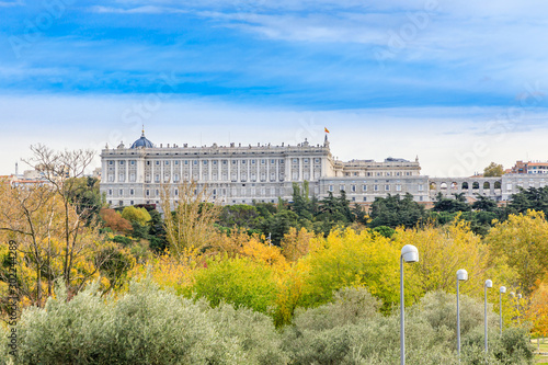 Royal Palace with trees with autumn color in Madrid © josevgluis