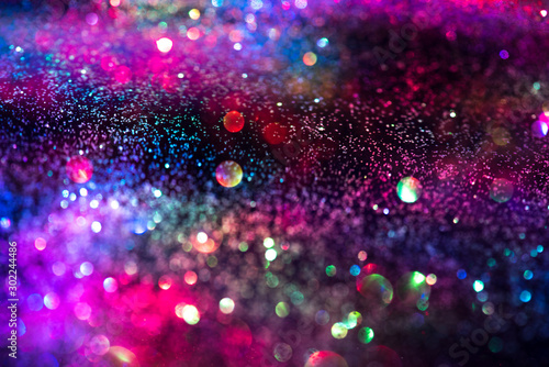 glitter bokeh lighting effect Colorfull Blurred abstract background for birthday, anniversary, wedding, new year eve or Christmas © wirakorn