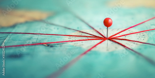 Find your way. Location marking with a pin on a map with routes. Adventure, discovery, navigation, communication, logistics, geography, transport and travel theme concept background. © Tryfonov