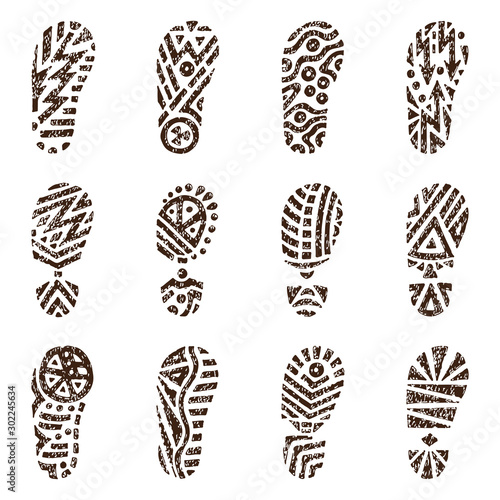 Set of grunge shoe tracks. Hand drawn doodles Vector illustration