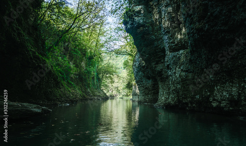 mountain river among rocks with green plants in Martville Canyon in Georgia