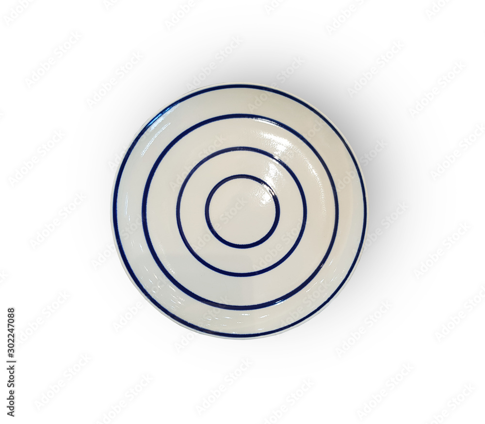 White plate with a blue stripe on the edge. Isolate View from above White plate with a blue stripe on the edge. Isolate View from above