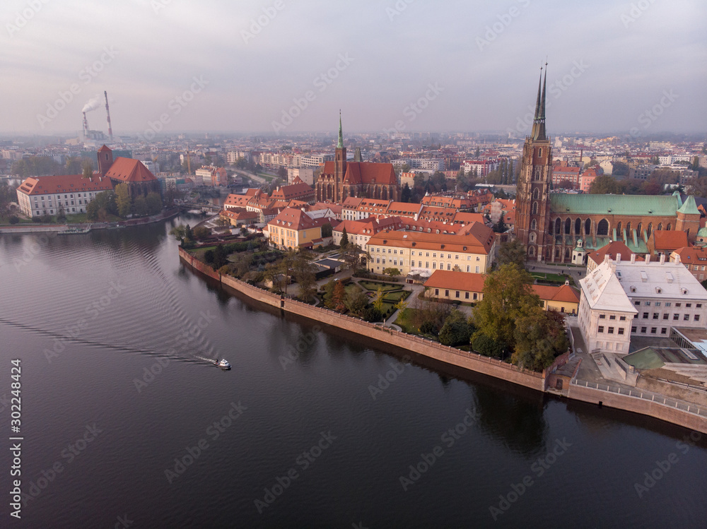The aerial view of Wroclaw: Ostrow Tumski, Cathedral of St. John the Baptist and Collegiate Church of the Holy Cross and St. Bartholomew