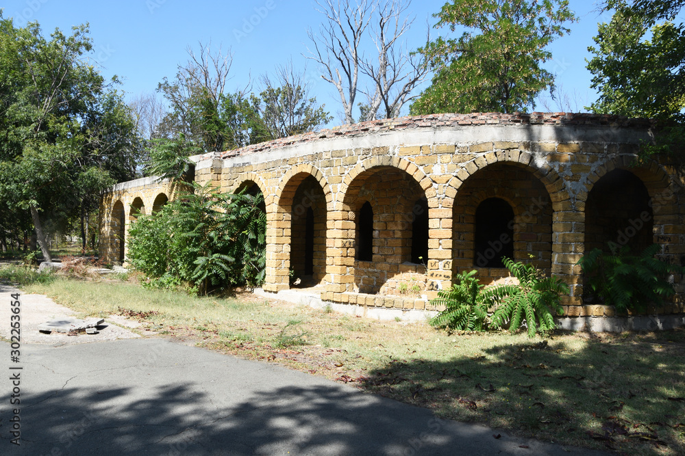 An old, dilapidated brick building.