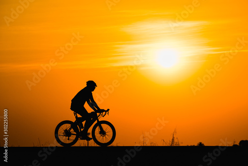 Wallpaper Mural Silhouette man cycling on sunset background Torontodigital.ca