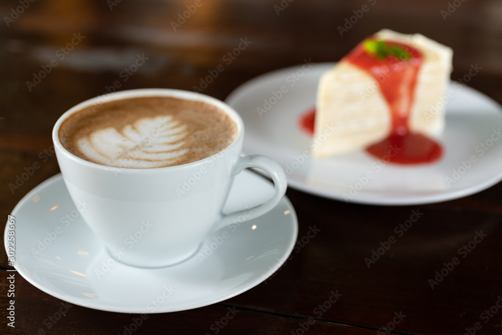 Coffee cup with Cake , image use for charge your energy in the morning Coffee cup with Cake , image use for charge your energy in the morning