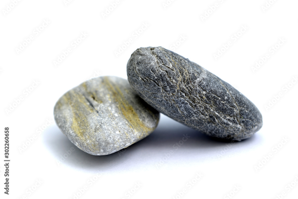 stone from the beach pictured in studio on white background stone from the beach pictured in studio on white background