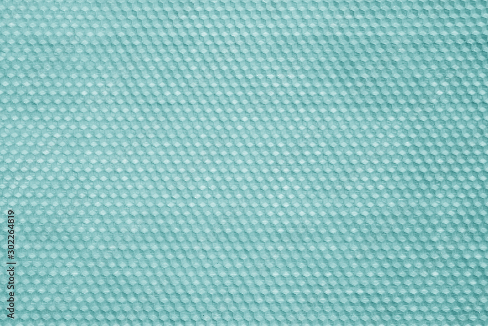 Honeycomb wax texture in cyan tone. Honeycomb wax texture in cyan tone.