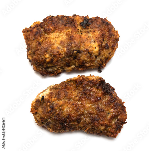 Grilled meatballs isolated on a white background.