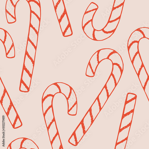 Hand drawn Christmas seamless pattern. Winter holiday background with candy canes