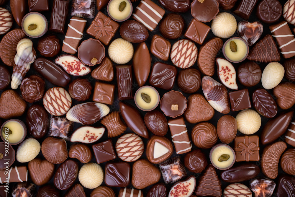 milk and dark chocolate candy background, gourmet sweet dessert. Stock