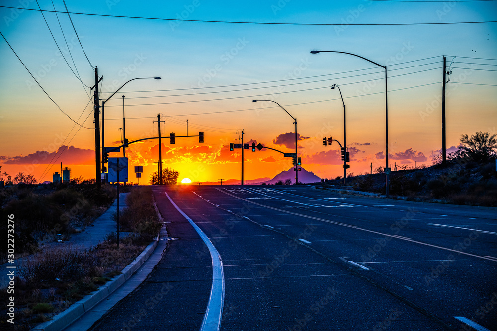 sun setting on a Mesa Arizona highway.
