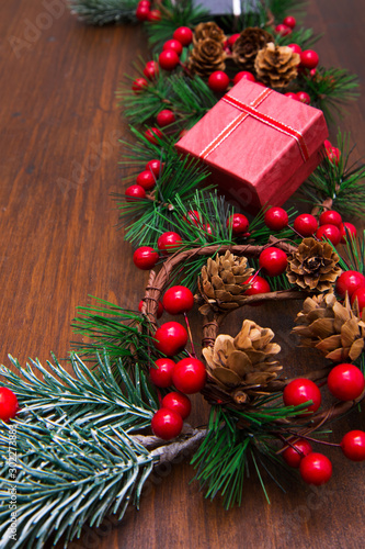 beautiful christmas decoration with fir branches on wood