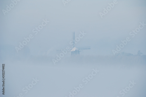 windmill in fog 