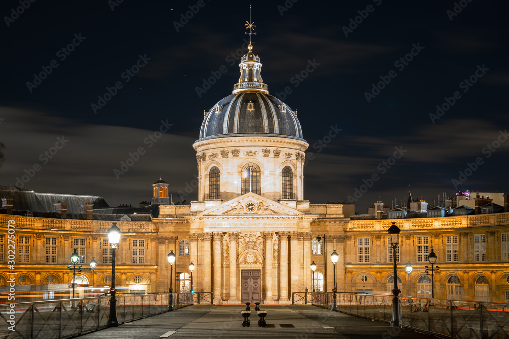 The Institute of France in night Paris cityscape