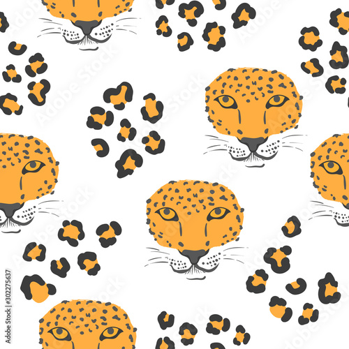 Vector seamless pattern with leopard heads and print.