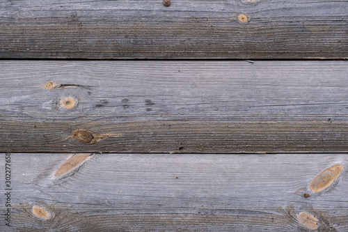 Round Log wall, old wood background. wall of wooden planks