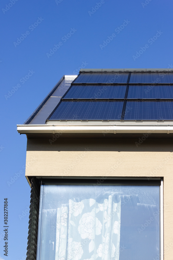 solar panel on a rooftop of a modern house