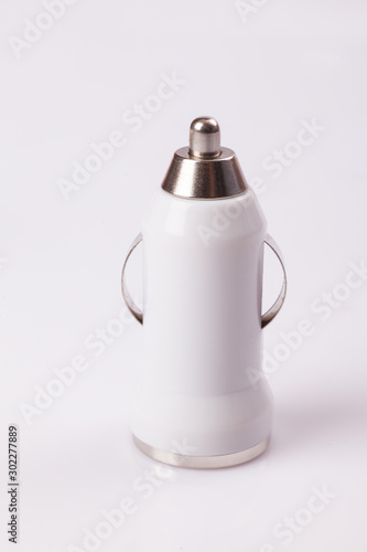 White adapter mobile phone charger on white background