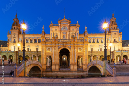 Plaza de Espana illuminated at night, Seville, Andalusia, Spain photo