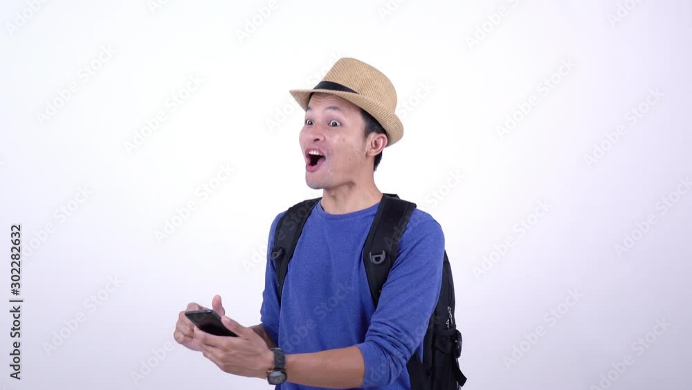 Asian Thai tourist using smart phone for shopping on line on white background Asian Thai tourist using smart phone for shopping on line on white background