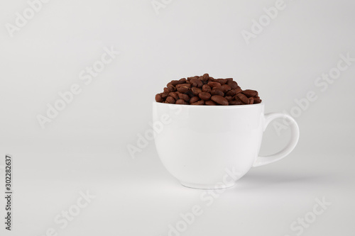 Coffee Cup with coffee on white background. Coffee bean