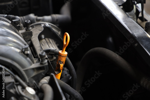 car engine close-up  oil dipstick