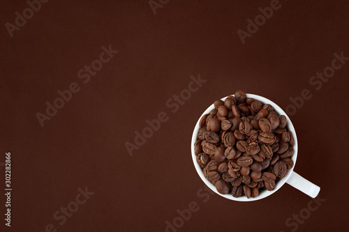 Coffee Cup with coffee. Coffee bean, view from the top.