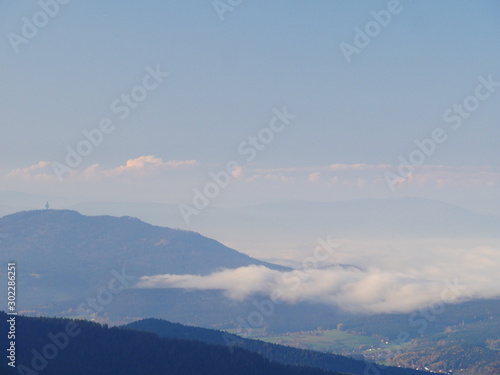 Cham, Deutschland: Blick auf den Hohenbogen und vom Nebel verborgene Furth im Wald vom großen Arber photo