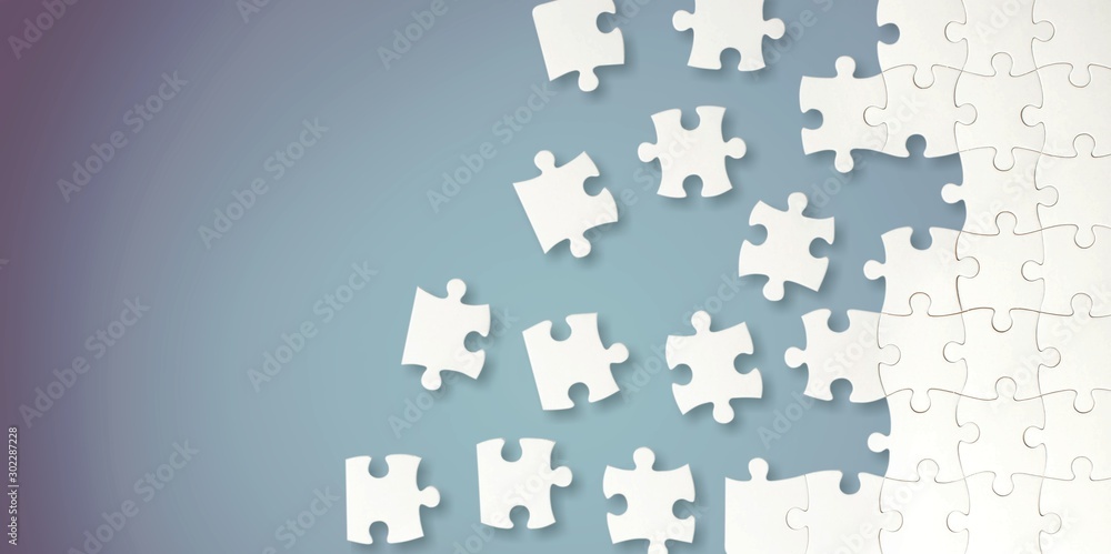 White puzzle pieces on grey background White puzzle pieces on grey background