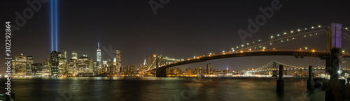 New York City skyline and 9/11 Memorial night panoramic. photo