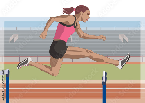 female hurdler jumping over hurdle with stadium in the background