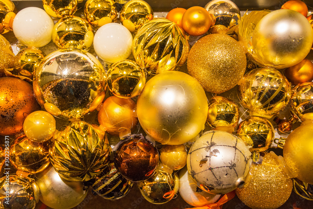 Golden color Christmas Balls in full frame as background pattern