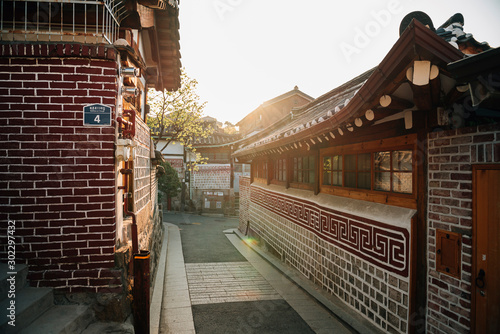 Traditional houses in Bukchon Hanok Village at sunrise, Seoul, South Korea photo