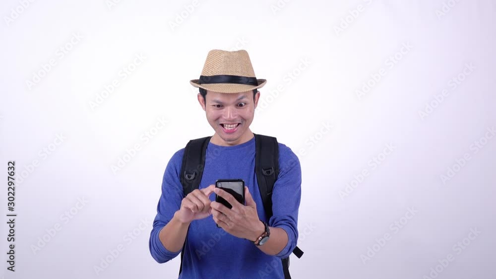 Asian Thai tourist using smart phone for shopping on line on white background Asian Thai tourist using smart phone for shopping on line on white background