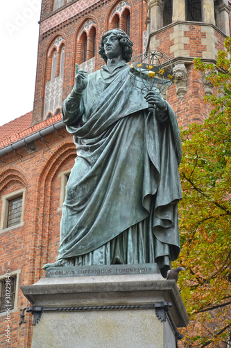 Statue of Nikolai Copernicus on a background the old town hall, 1853. Torun, Poland