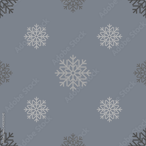 Seamless pattern with dark snowflakes on a gray background. Snowflakes of different size and density. Vector illustration