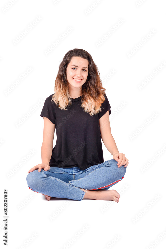 Portrait of young woman in a studio. Portrait of young woman in a studio.