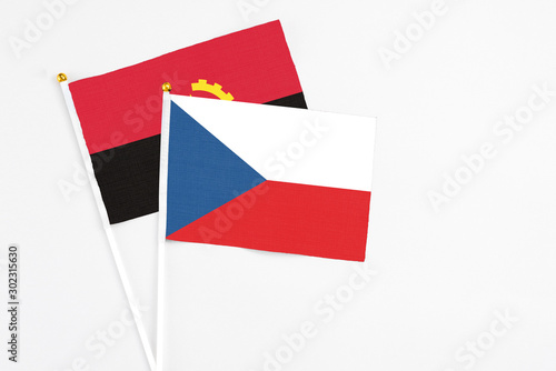 Free Download Czech Republic and Angola stick flags on white background. High quality fabric, miniature national flag. Peaceful global concept.White floor for copy space. - GFXLoad