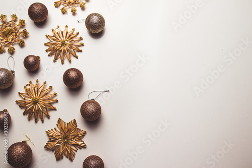 Creative arrangement of bright straw christmas toys on white background. flat lay, top view