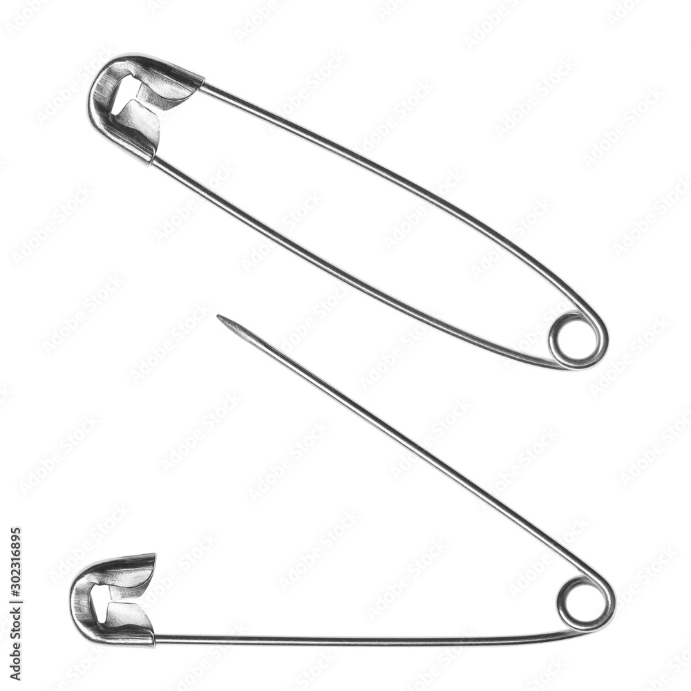 Closed and open safety pin, isolated on white background Closed and open safety pin, isolated on white background
